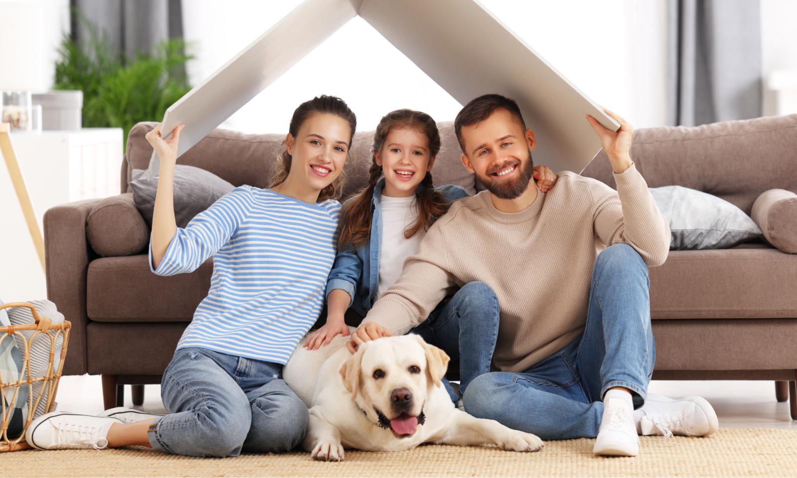family and dog in their new home