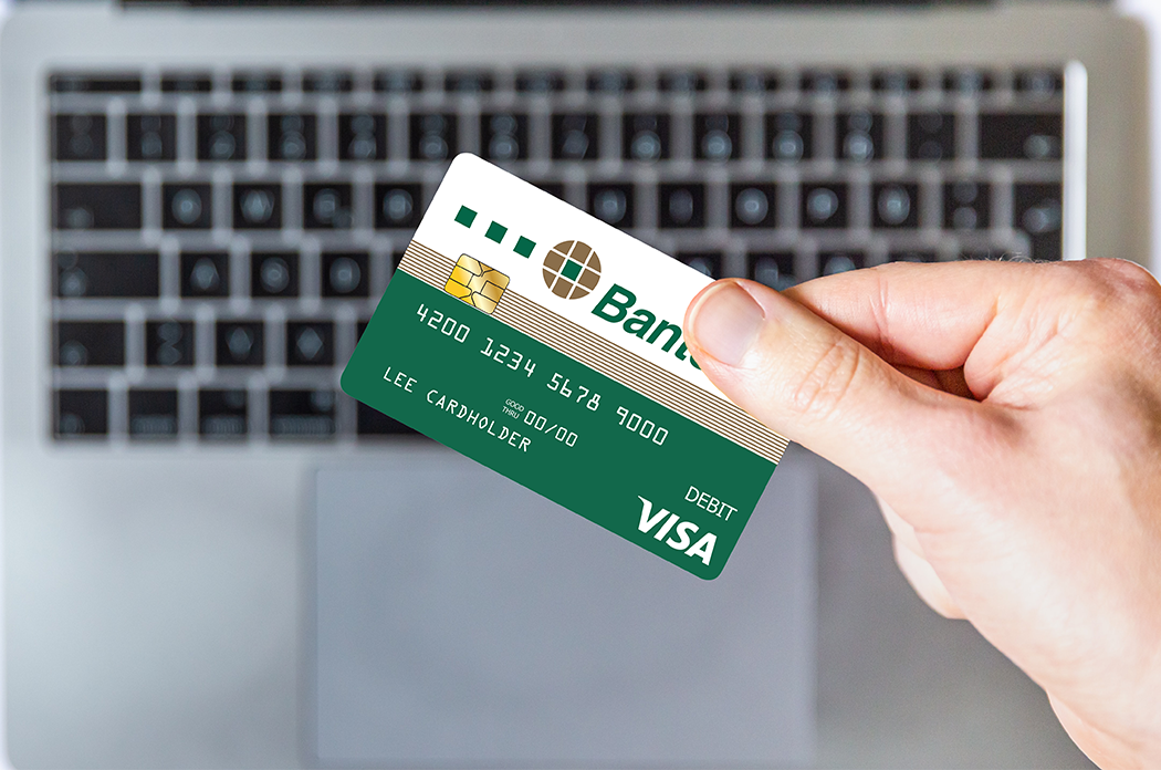 image of someone holding  a Banterra Visa Debit Card