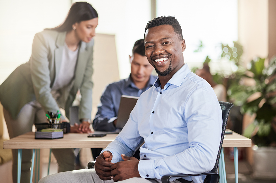 African american business man sitting at desk